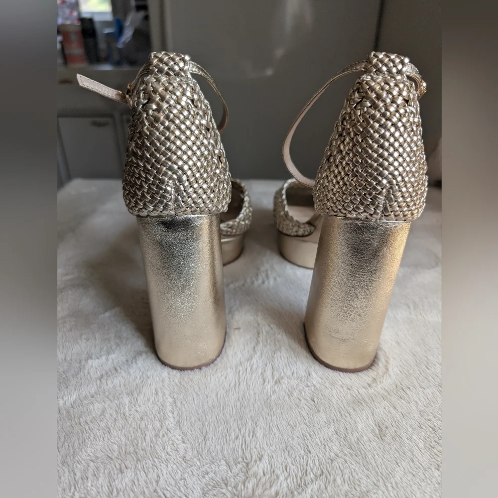 Sam Edelman Nattie platform sandals in metallic gold woven leather.